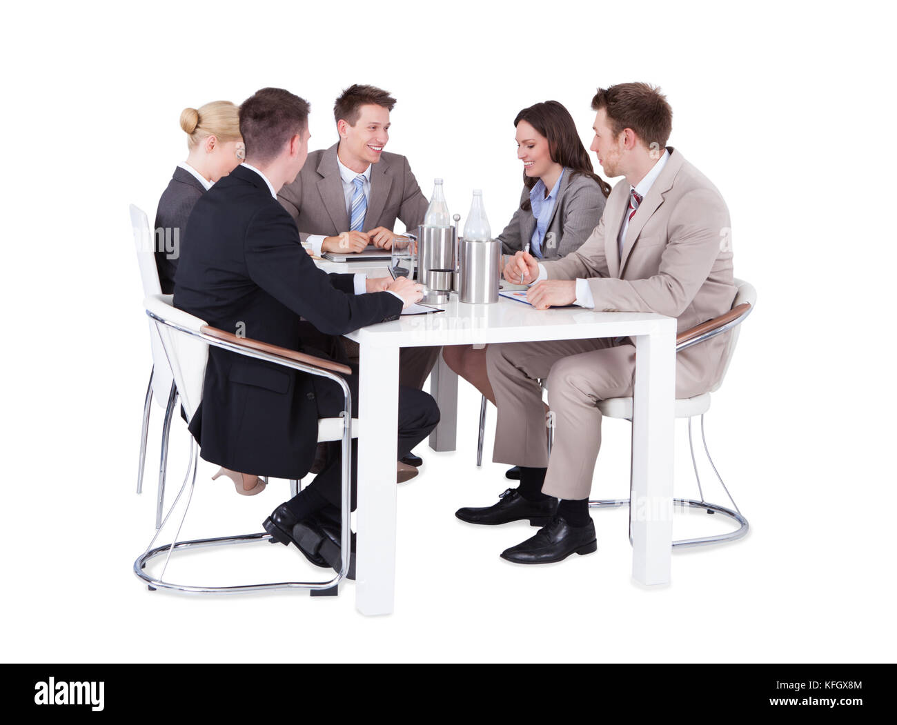 Full length of business people having conference meeting over white  background Stock Photo - Alamy