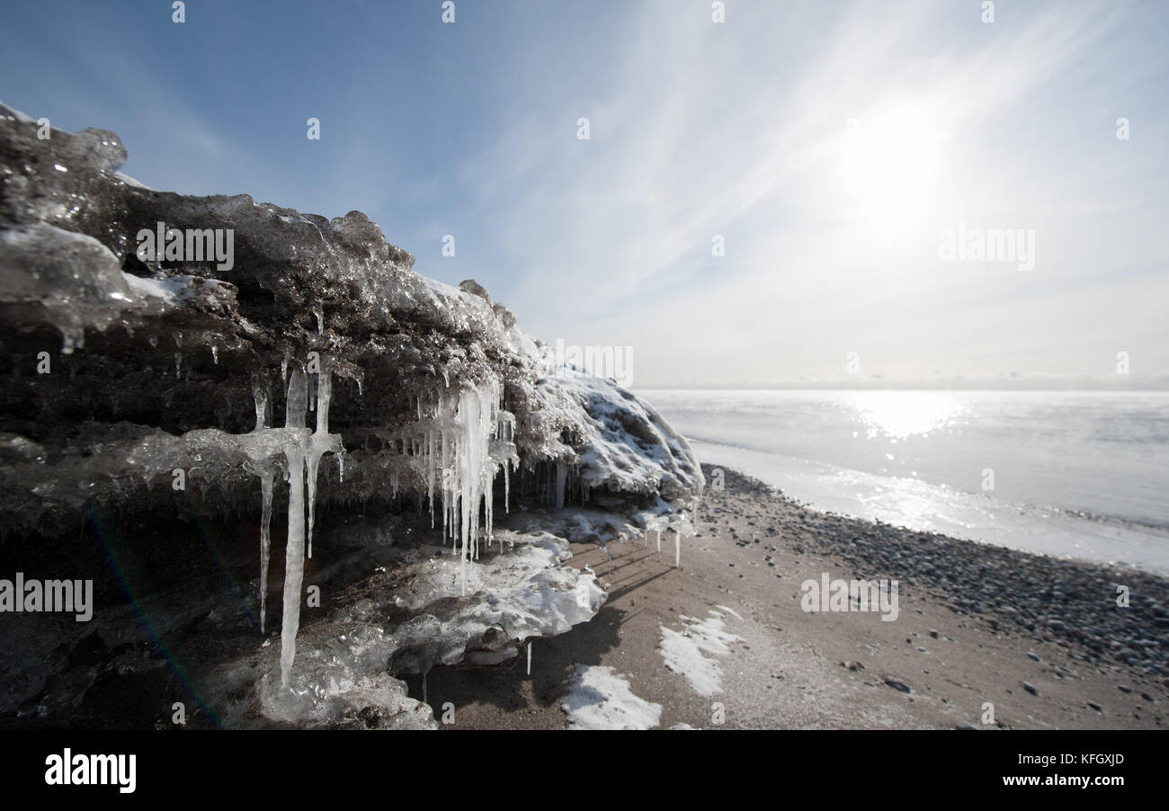 Landscape view of icy beach along Lake Ontario after the December 2013 ice storm during polar vortex of 2014 in Whitby, ON, Canada Stock Photo