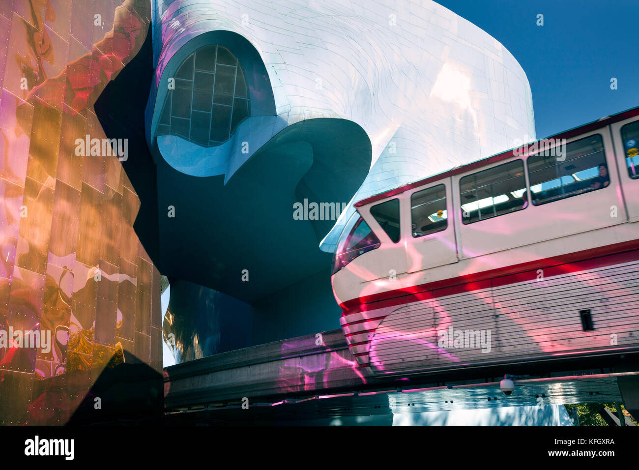 WA14138-00...WASHINGTON - The Monorail entering the tunnel through the Museum Of Pop Culture  located at the Seattle Center. Stock Photo