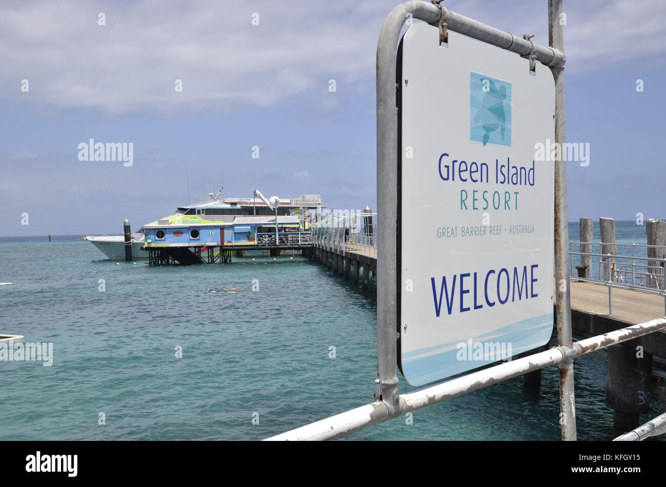 A Cairns ferry discharges tourists at the wharf at the resort of Green Island on the Great barrier reef in northern Queensland, Australia Stock Photo