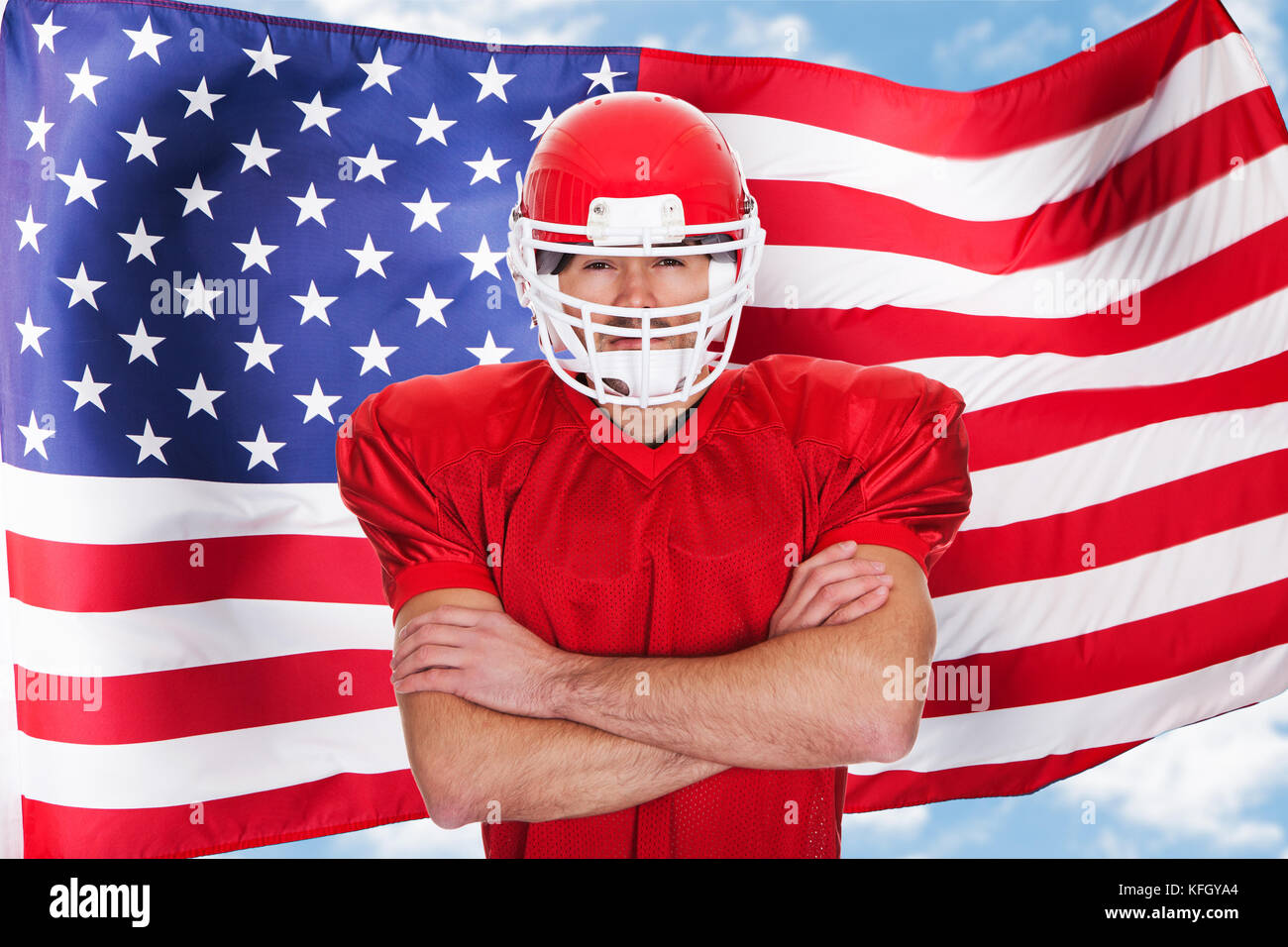 American Football Sportsman Player Standing In Front Of American Flag