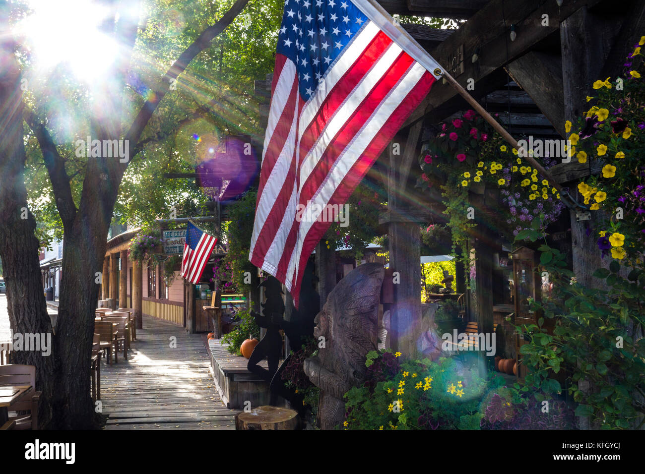 WA14228-00...WASHINGTON - Flags along the street in the town Of Winthorp on the east side of the North Cascades. Stock Photo