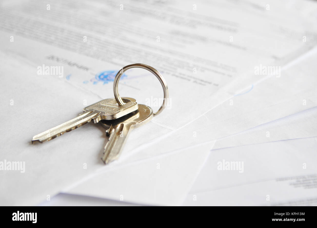 Rental agreement. Keys over documents. Property concept Stock Photo Alamy