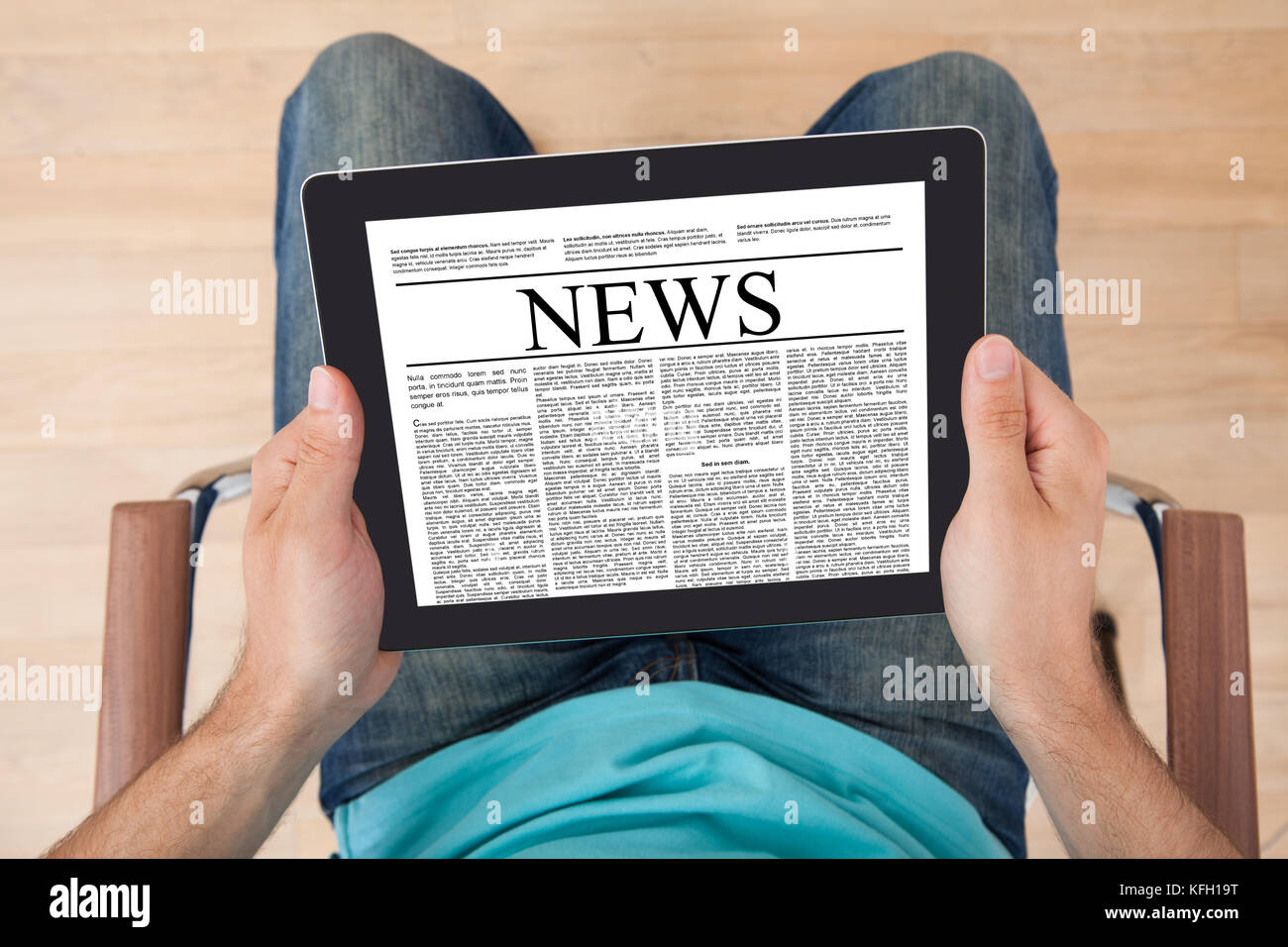 Newspaper Tablet Screen High Resolution Stock Photography and Images