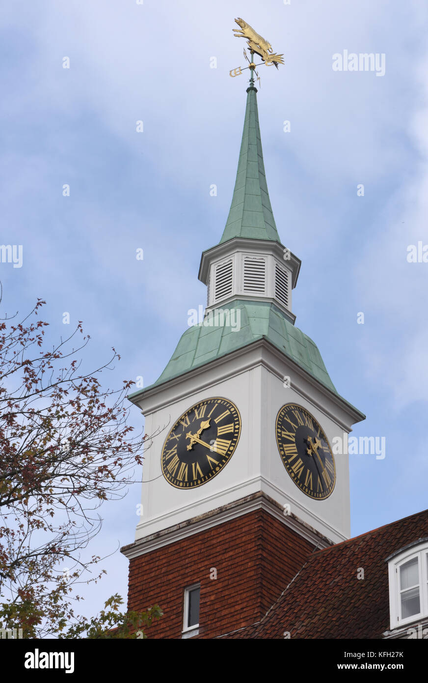 Tower with clock, spire and weather vane above the Hampshire County Council buildings in Winchester. Winchester, Hampshire. Stock Photo
