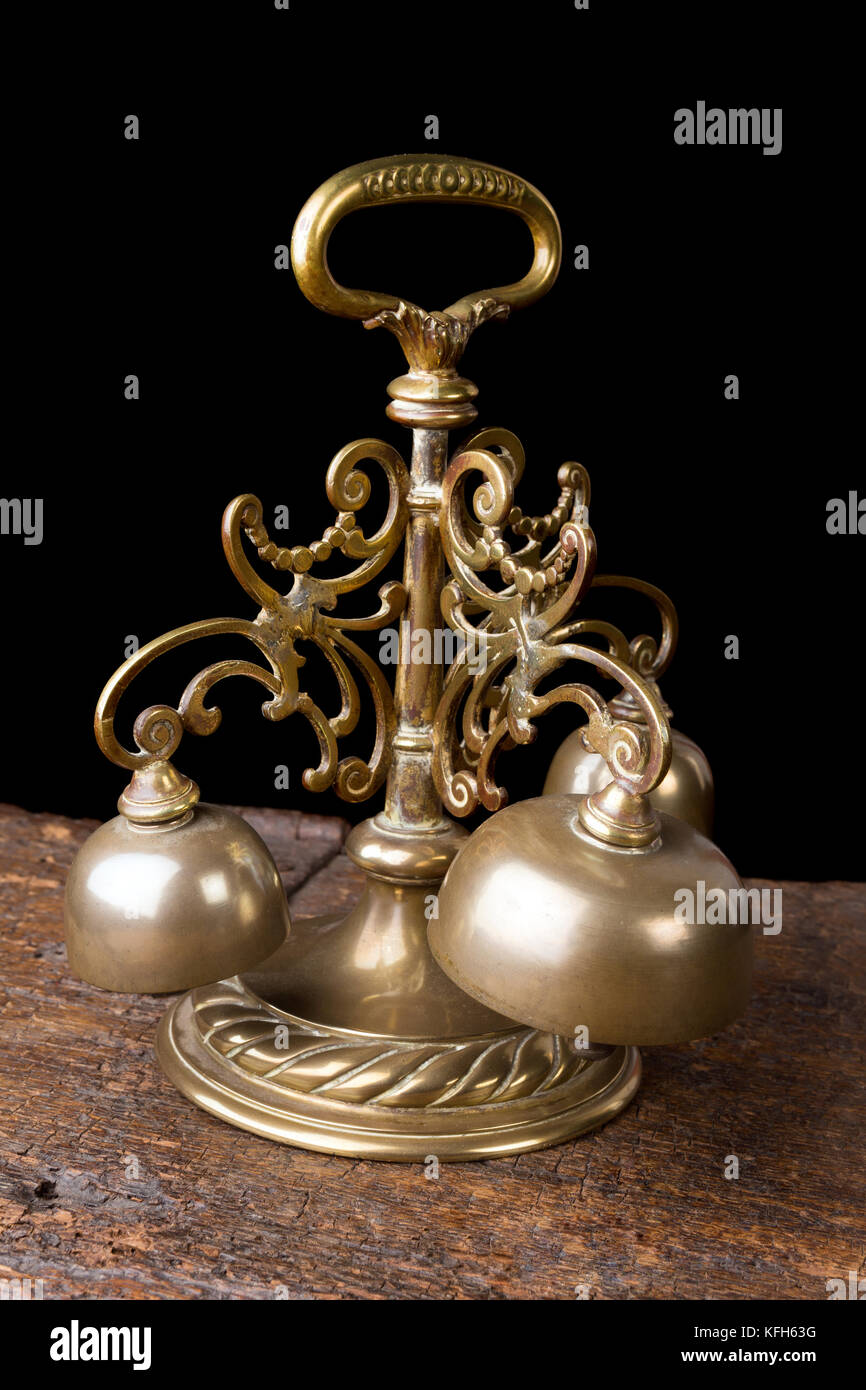 Copper church bells as used at consecration during catholic mass Stock
