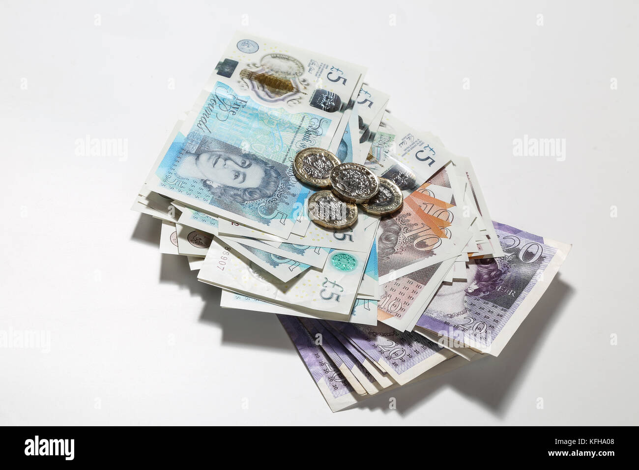 New British £5 and £10 note with monopoly money Stock Photo