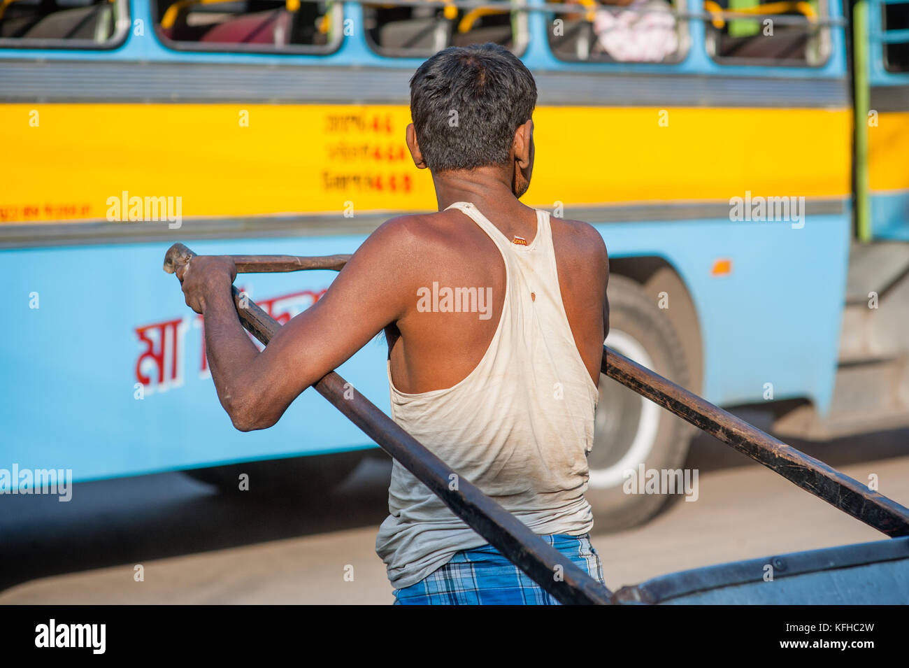 Man pulling rickshaw Stock Photo