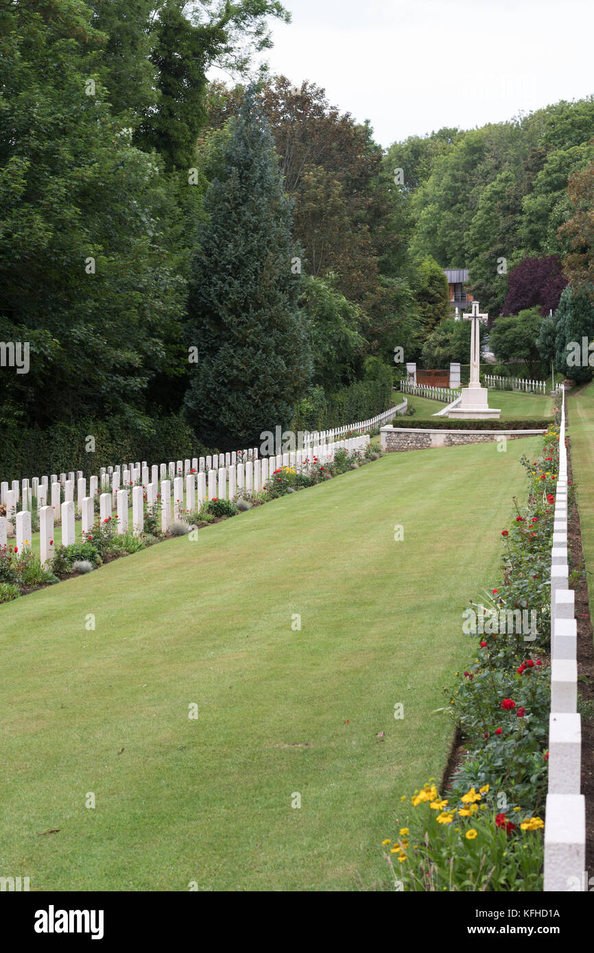 Rows of graves and memorial Cross of Sacrifice, Military Cemetery, Saint Valery en Caux, Normandy, France, Europe Stock Photo