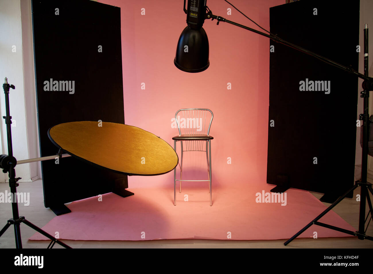 PhotoStudio with a pink background Flash reflector Stock Photo