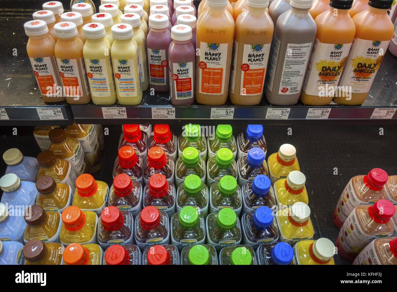Assortment of Happy Planet Bottled Juices on Sale in Save on Foods Grocery Store Stock Photo