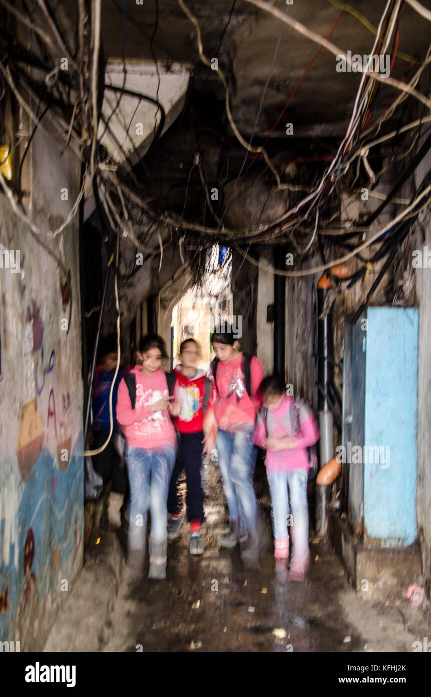 Beirut, Lebanon. 2nd Mar, 2016. Children getting off to school in the middle of Shatila refugee camp.Lebanon host over a million of refugees that had fled from the neighboring country seeking safety. In the refugee camps they face issues such as daily harassments, domestic violence, lack of sanitary assistance and education, food and water shortage and housing issues. Credit: Susanna D'Aliesio/SOPA/ZUMA Wire/Alamy Live News Stock Photo