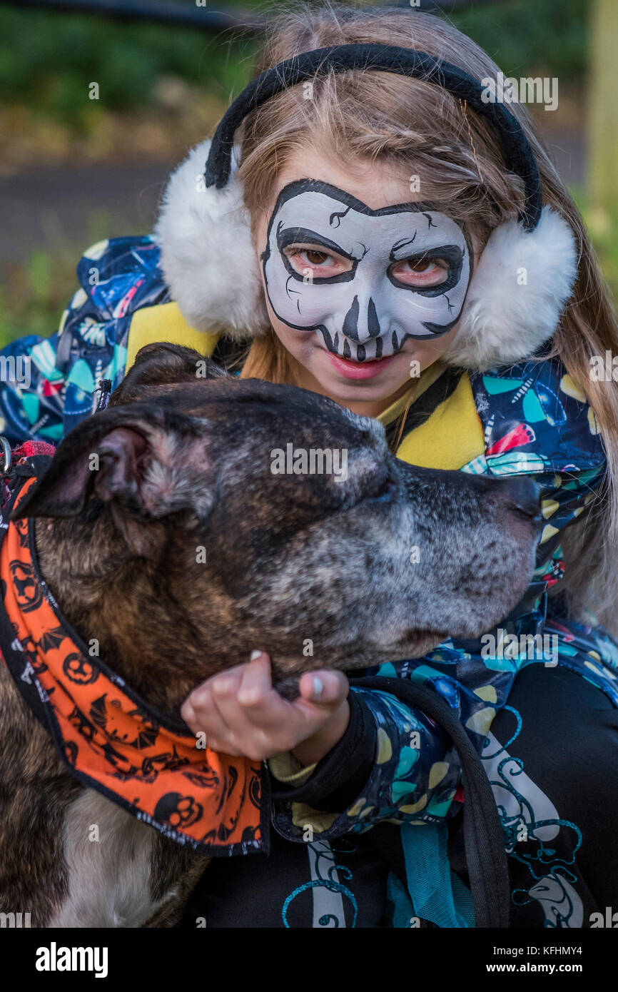 Hampstead Heath, London, UK. 29th Oct, 2017. Robin a Staffi, with Sophia - The walk on Hampstead Heath - A charity Halloween dog walk and Fancy Dress Show organised by All Dogs Matter at the Spaniards Inn, Hampstead. London 29 Oct 2017. Credit: Guy Bell/Alamy Live News Stock Photo