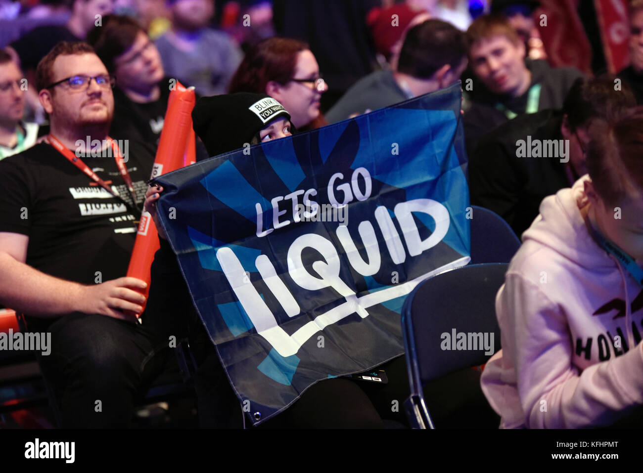 A female fan of the 'Team Liquid' supports her team during the semi-final game at the ESL One e-sport event in the Barclaycard Arena in Hamburg, Germany, 29 October 2017. The event is one of the biggest e-sport events in Germany. Contestants are playing the computer game 'Dota 2' for a prize of one million US dollars. Photo: Marek Majewsky/dpa Stock Photo