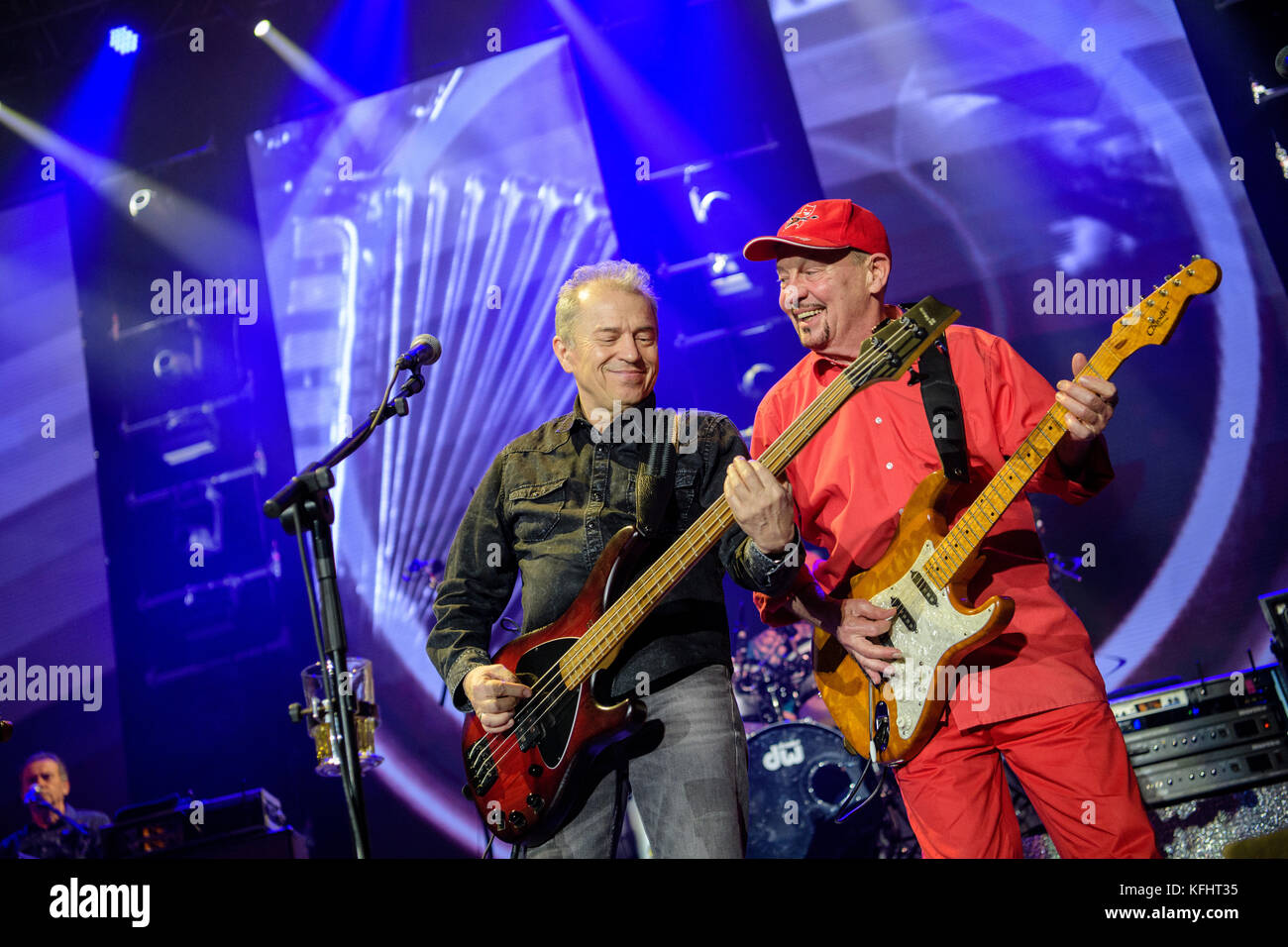Singer and bass player Guenther Sigl (L) and guitar player Barny Murphy perform in the course of the anniversary concert of the Spider Murphy Gang in the Olympiahalle in Munich, Germany, 29 October 2017. The Spider Murphy Gang celebrates its 40th stage anniversary with the concert. Photo: Matthias Balk/dpa Stock Photo