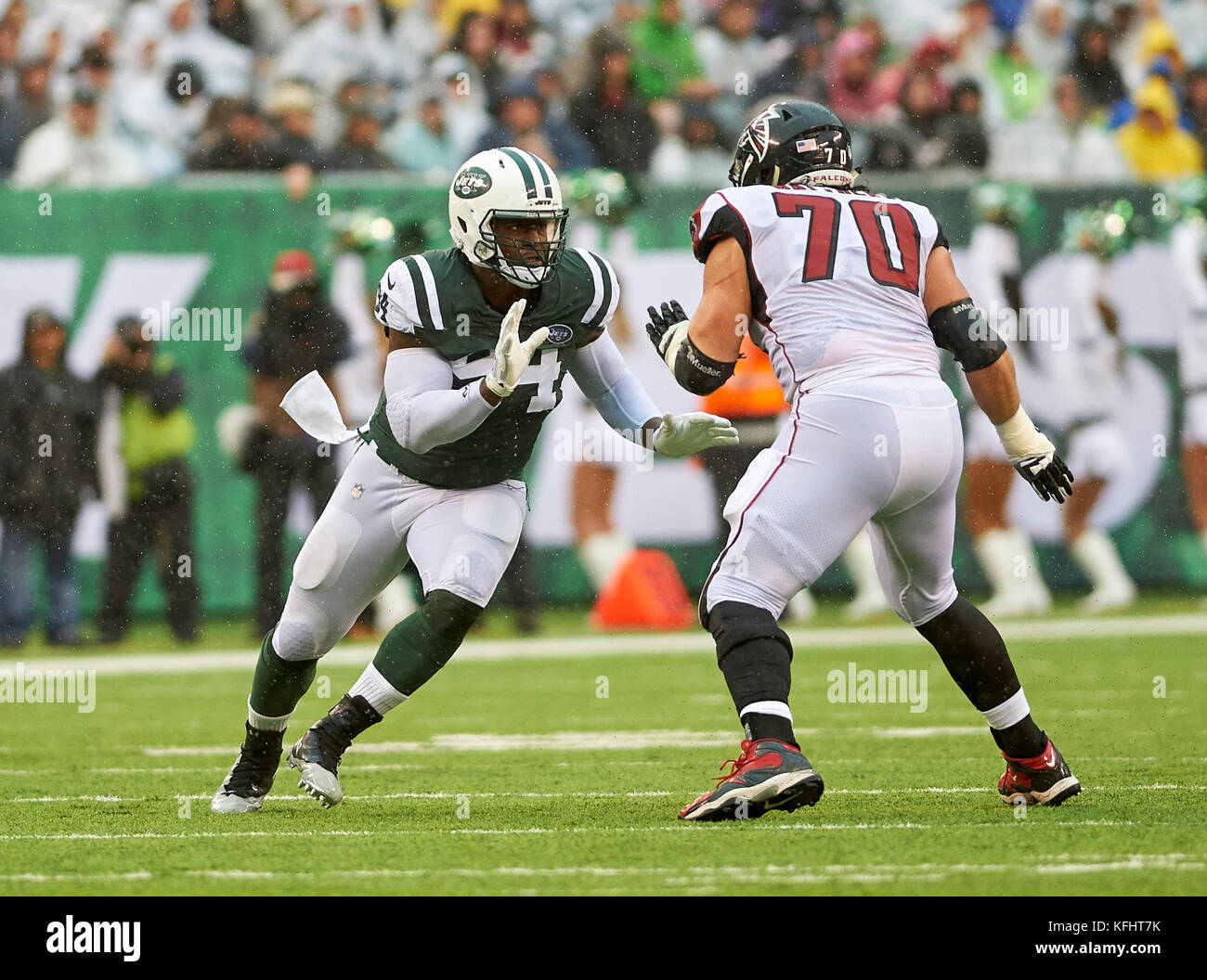 East Rutherford, New Jersey, USA. 29th Oct, 2017. Jets' defensive linemen Kony Ealy (94) tries to get around Falcons tackle Jake Matthews (70) during NFL action between the Atlanta Falcons and the New York Jets at MetLife Stadium in East Rutherford, New Jersey. Duncan Williams/CSM/Alamy Live News Stock Photo