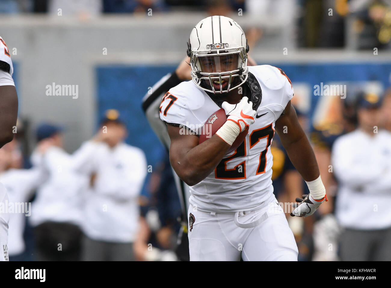 Morgantown, West Virginia, USA. 28th Oct, 2017. Oklahoma State Cowboys running back J.D. KING (27) runs with the ball during a game played at Mountaineer Field in Morgantown, WV. Oklahoma State beat WVU 50-39. Credit: Ken Inness/ZUMA Wire/Alamy Live News Stock Photo