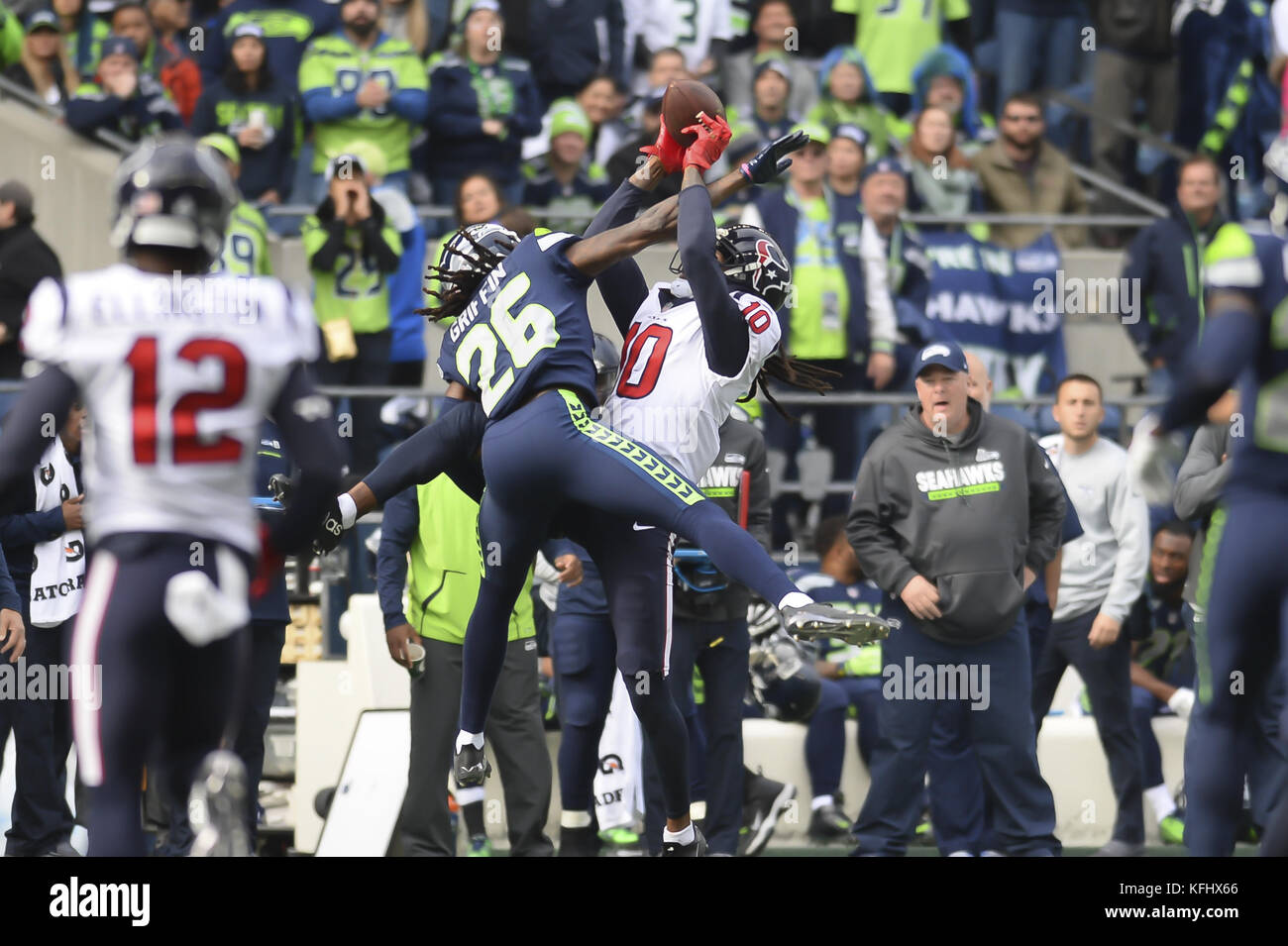 Seattle, Washington, USA. 29th Oct, 2017. Seattle's SHAQUILL GRIFFIN (26) and Houston's DeANDRE HOPKINS (10) go up for a pass that fell incomplete as the Houston Texans visit the Seattle Seahawks for an NFL game at Century Link Field in Seattle, WA. Credit: Jeff Halstead/ZUMA Wire/Alamy Live News Stock Photo