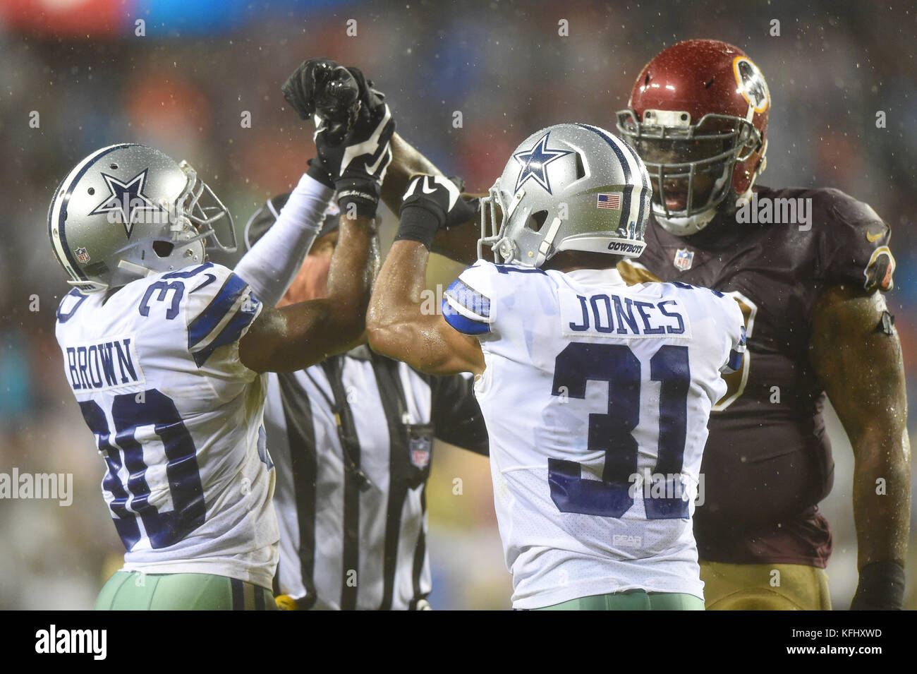 Landover, MD, USA. 29th Oct, 2017. It got a little chippy toward the end of  the game between Dallas Cowboys cornerback Anthony Brown (30), Dallas free  safety Byron Jones (31) and Washington