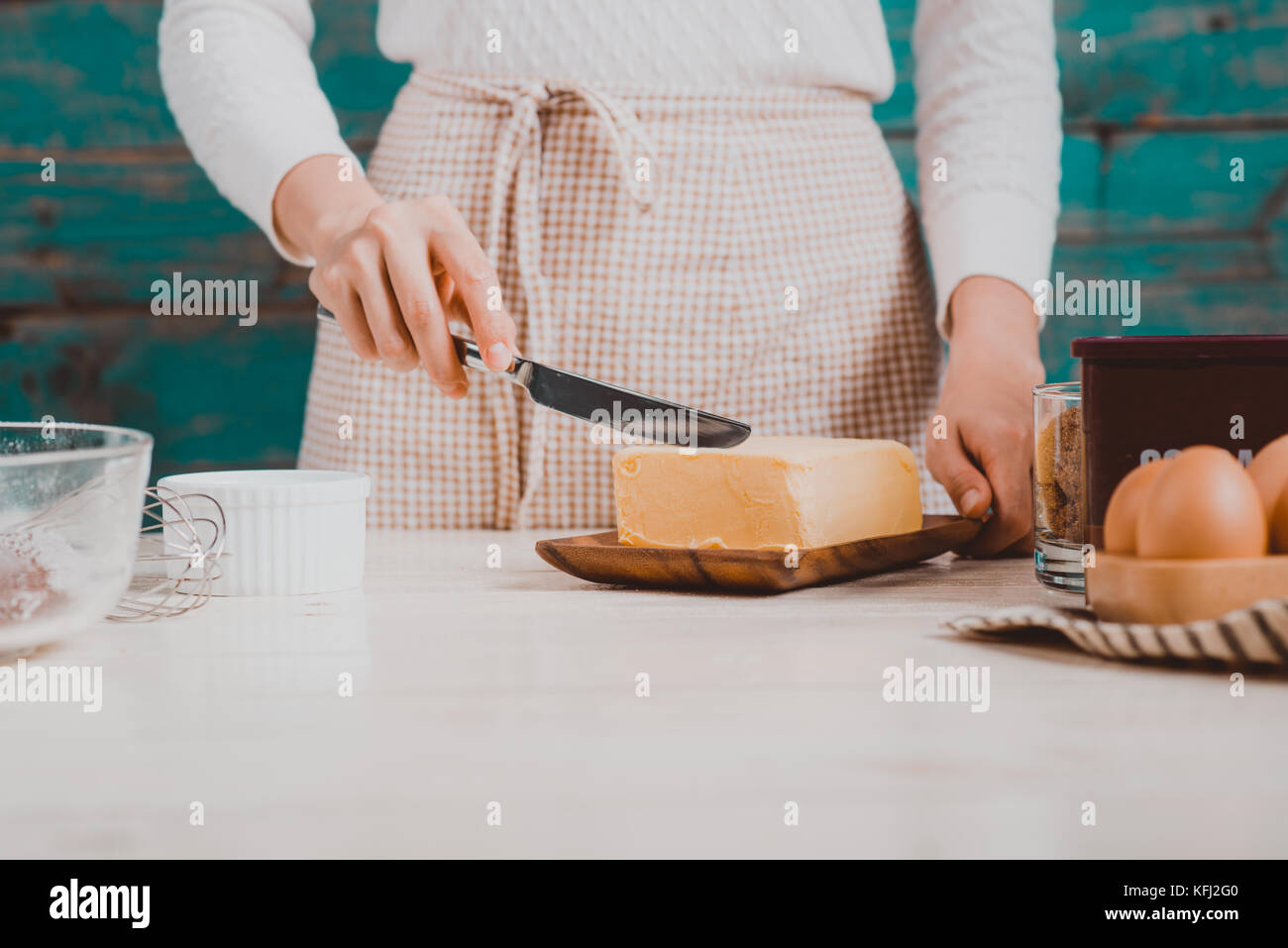 House wife wearing apron making. Steps of making cooking chocolate cake. Stock Photo