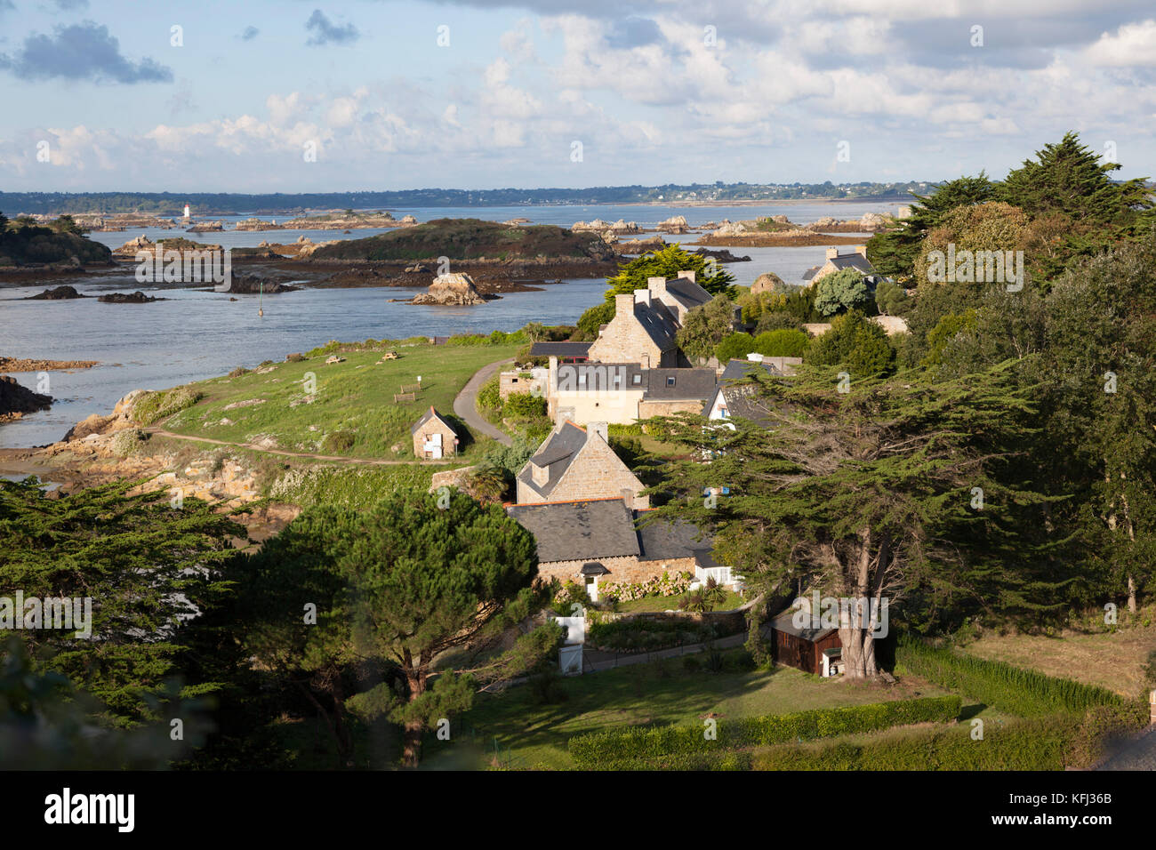 A high angle shot on houses of Brehat from the vantage point of the Saint Michel chapel. The housing uses a quality material : the pink granite. Stock Photo