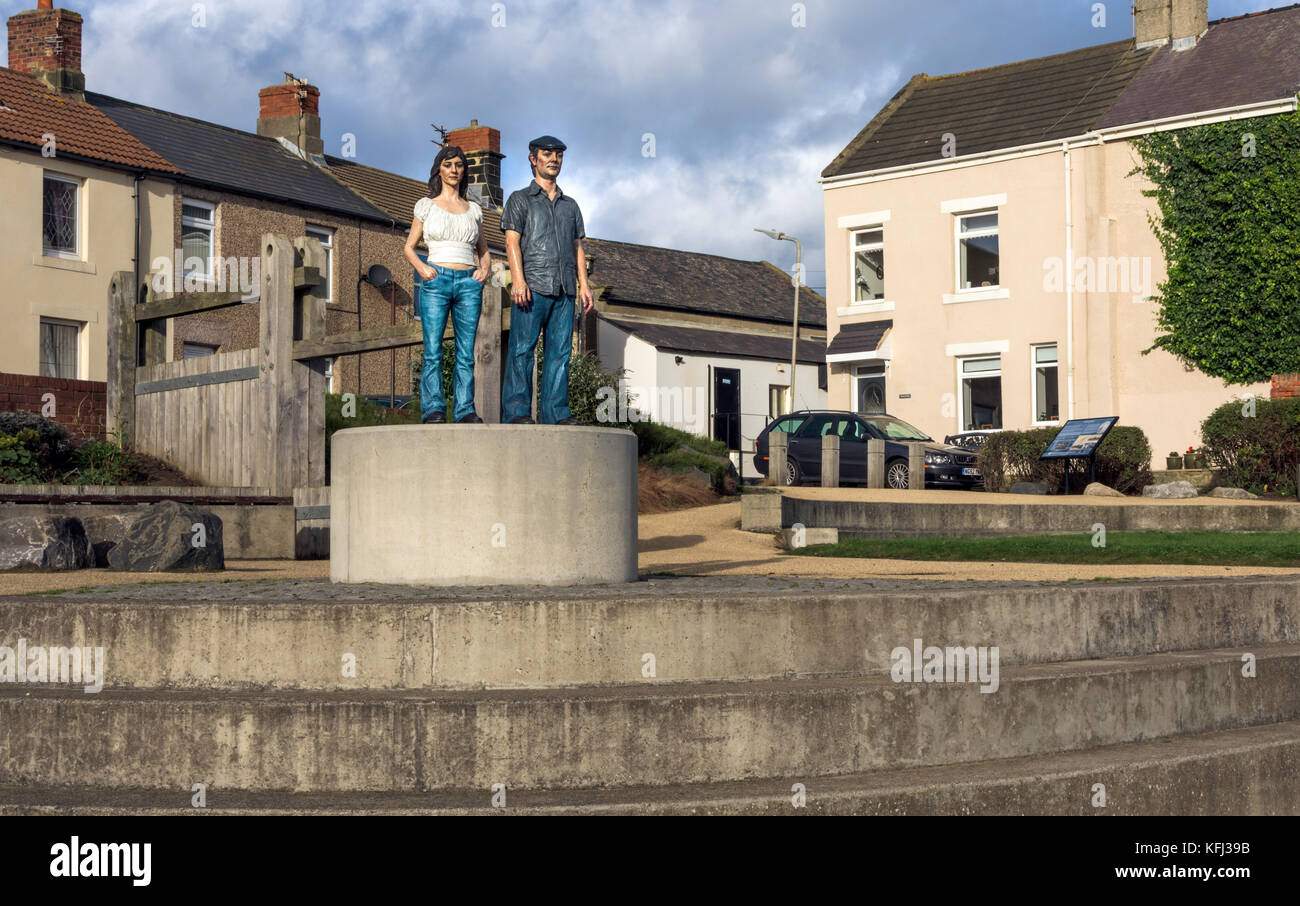 Statue of a man and a women looking out to sea at Newbiggin by the sea