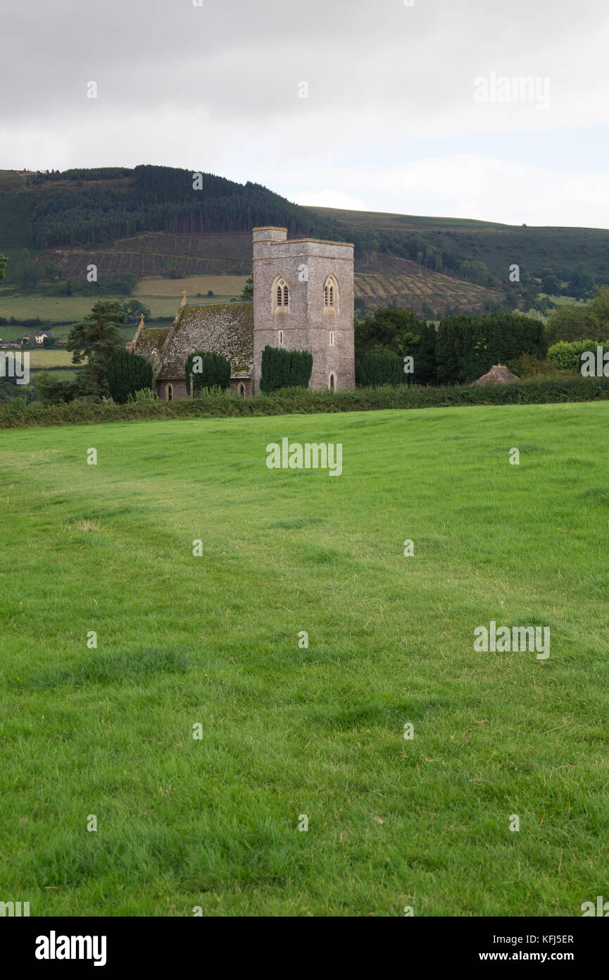 St Gastyn's Church at Llangasty Talyllyn, close to the shore of Llangorse Lake seen in the distance. Stock Photo