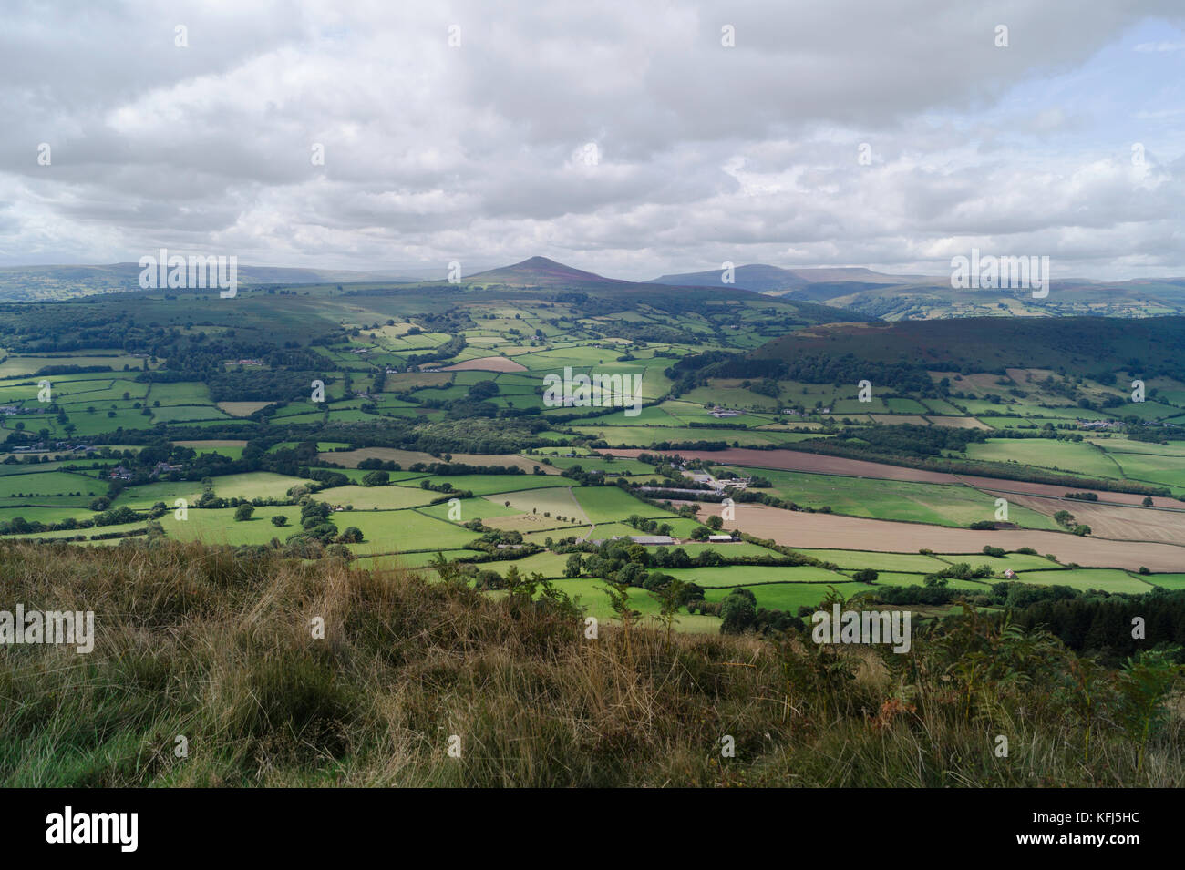 View of Sugar Loaf seen from Ysgyryd Fawr on the Eastern edge of the Brecon Beacons. Stock Photo