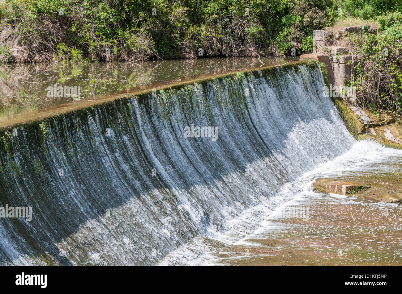 river with diversion dam Stock Photo