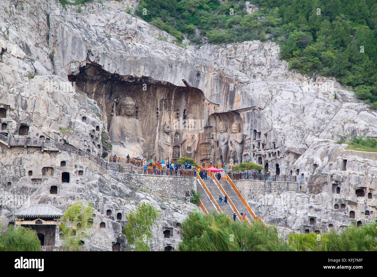 Famous Longmen Grottoes (statues of Buddha and Bodhisattvas carved in the monolith rock near Luoyang in Hennn province, China) Stock Photo