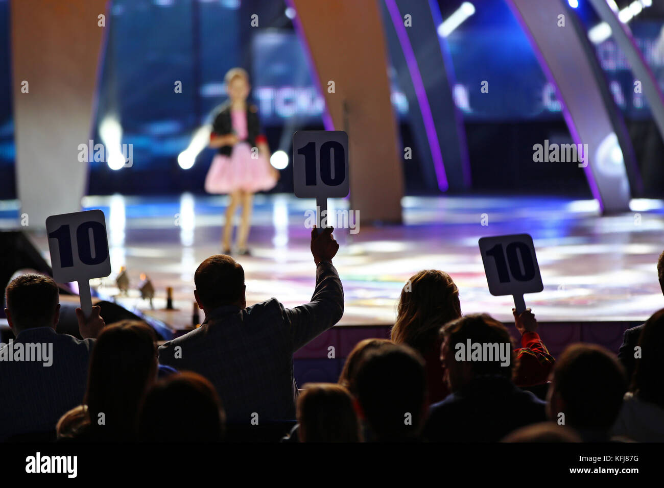 Voting contest of young singers, silhouettes jury Stock Photo - Alamy