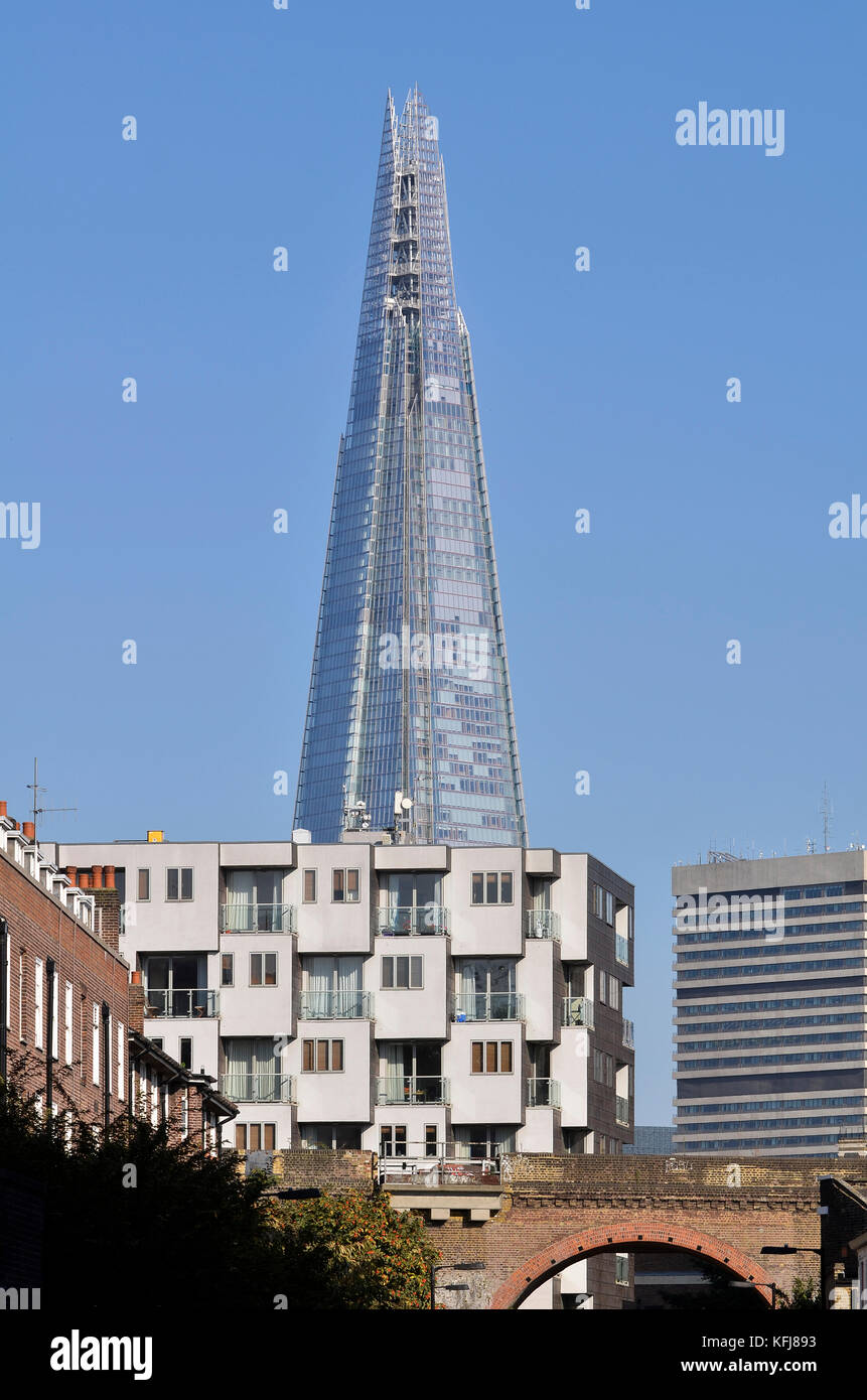 Residential apartment blocks, London, SE1, UK. Looking from Pocock Street across Great Suffolk Street. The Shard and Guy's Hospital behind. Stock Photo