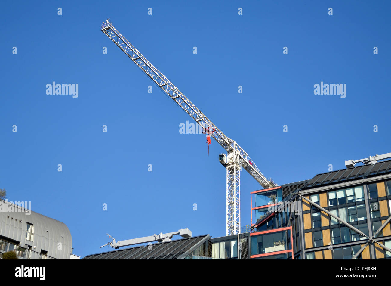 Tower crane, London, UK. Hopton Street SE1 buildings in foreground. Stock Photo