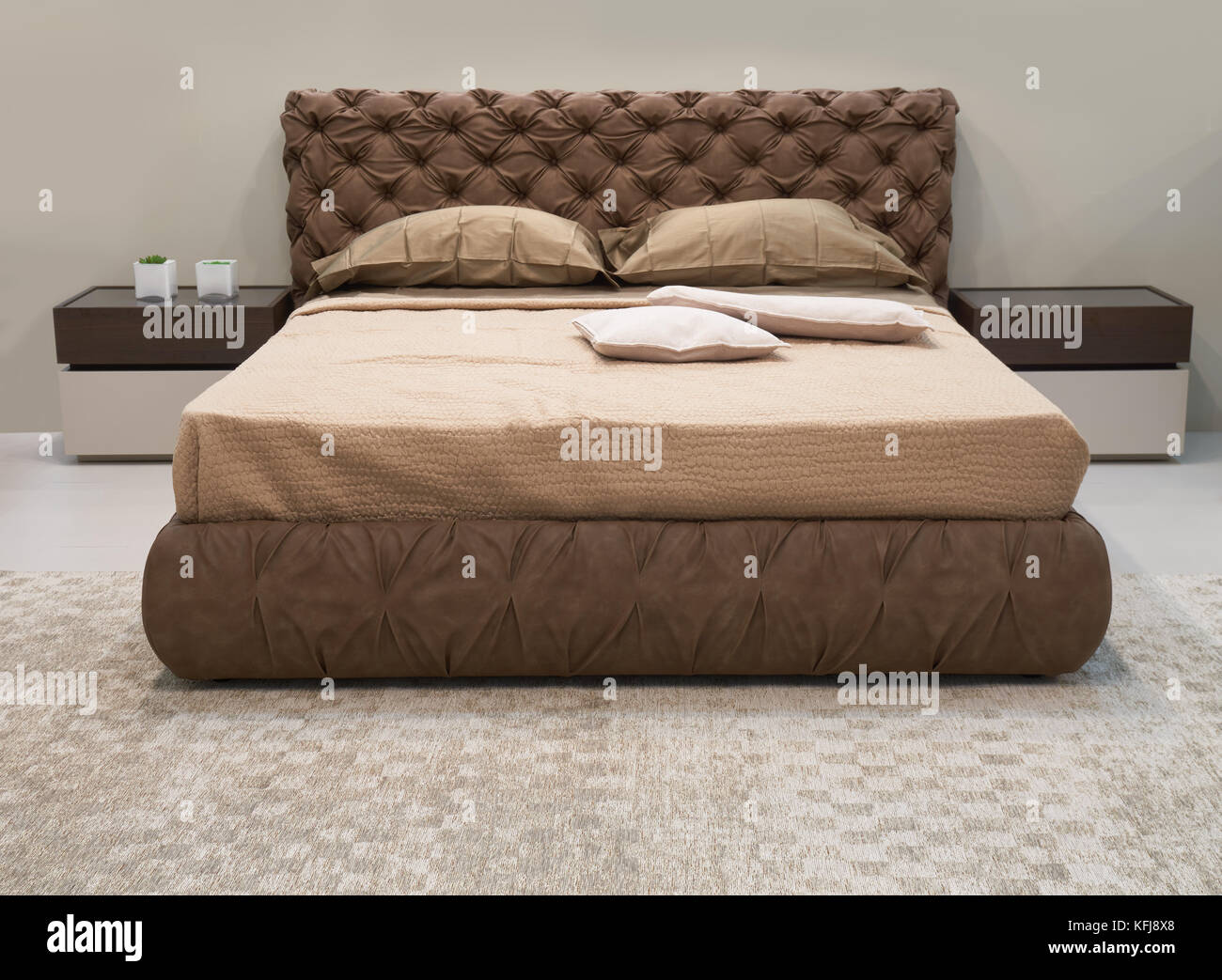 New brown double bed in the bedroom Stock Photo - Alamy