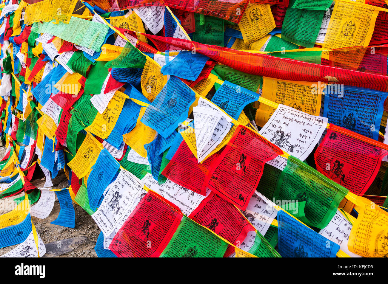 Colorful Tibetan prayer flags in Yumbulakhang Palace - Tibet Stock Photo