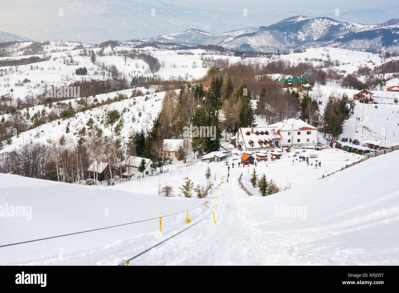 Vintage ski lift on snow covered mountain Stock Photo