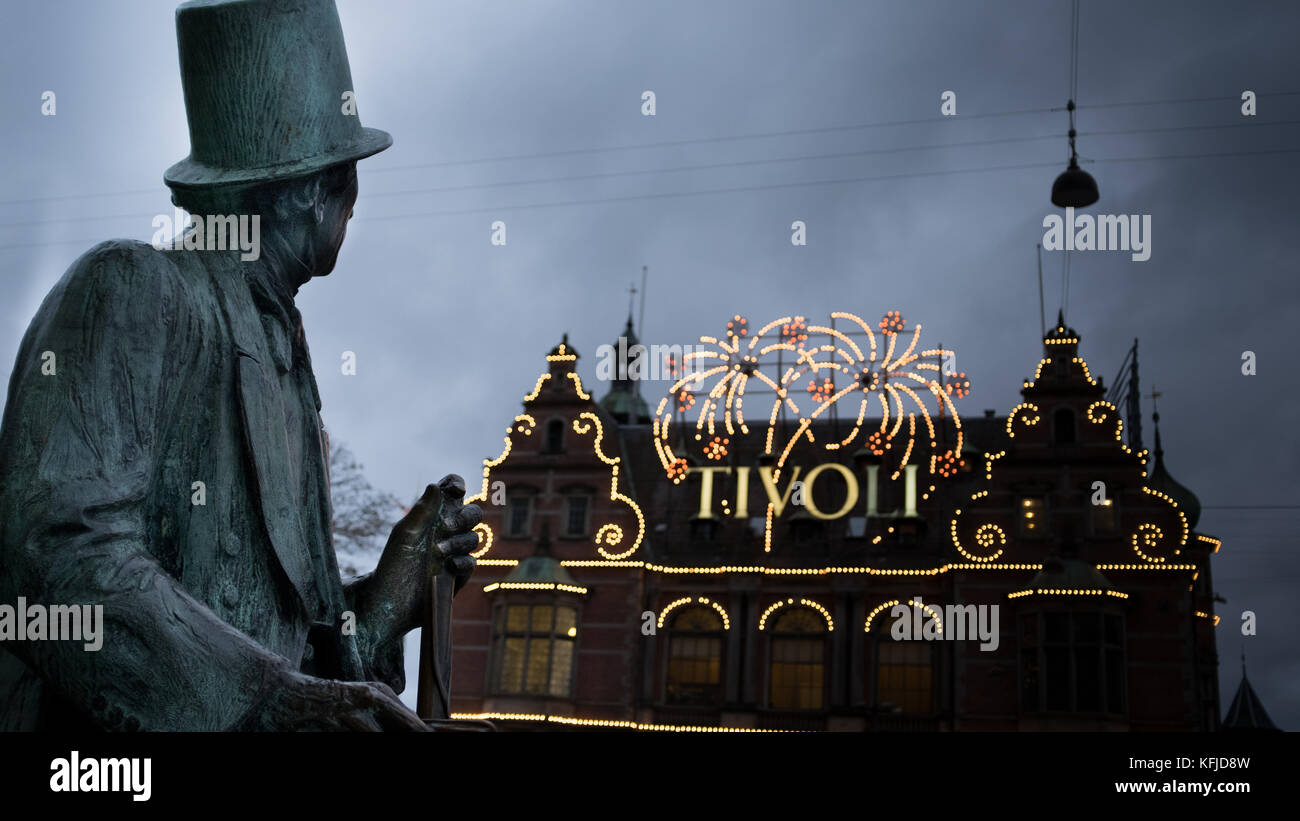 Hans Christian Andersen's statue overlooks Tivoli, the world's second oldest amusement park, Copenhagen, Denmark Stock Photo