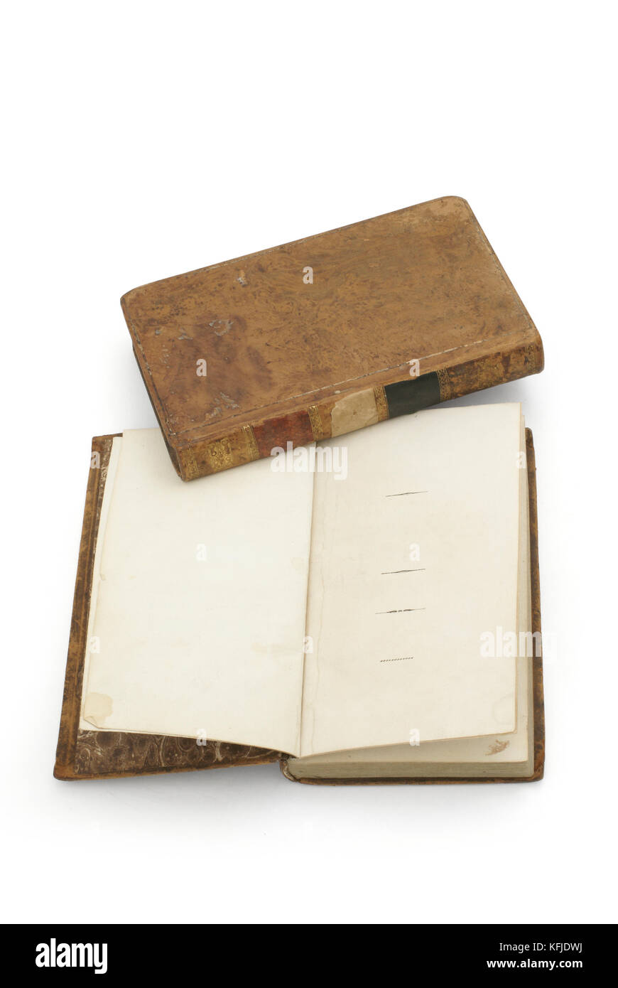 Old book open on both blank shabby pages with stains and scratches. Stock Photo