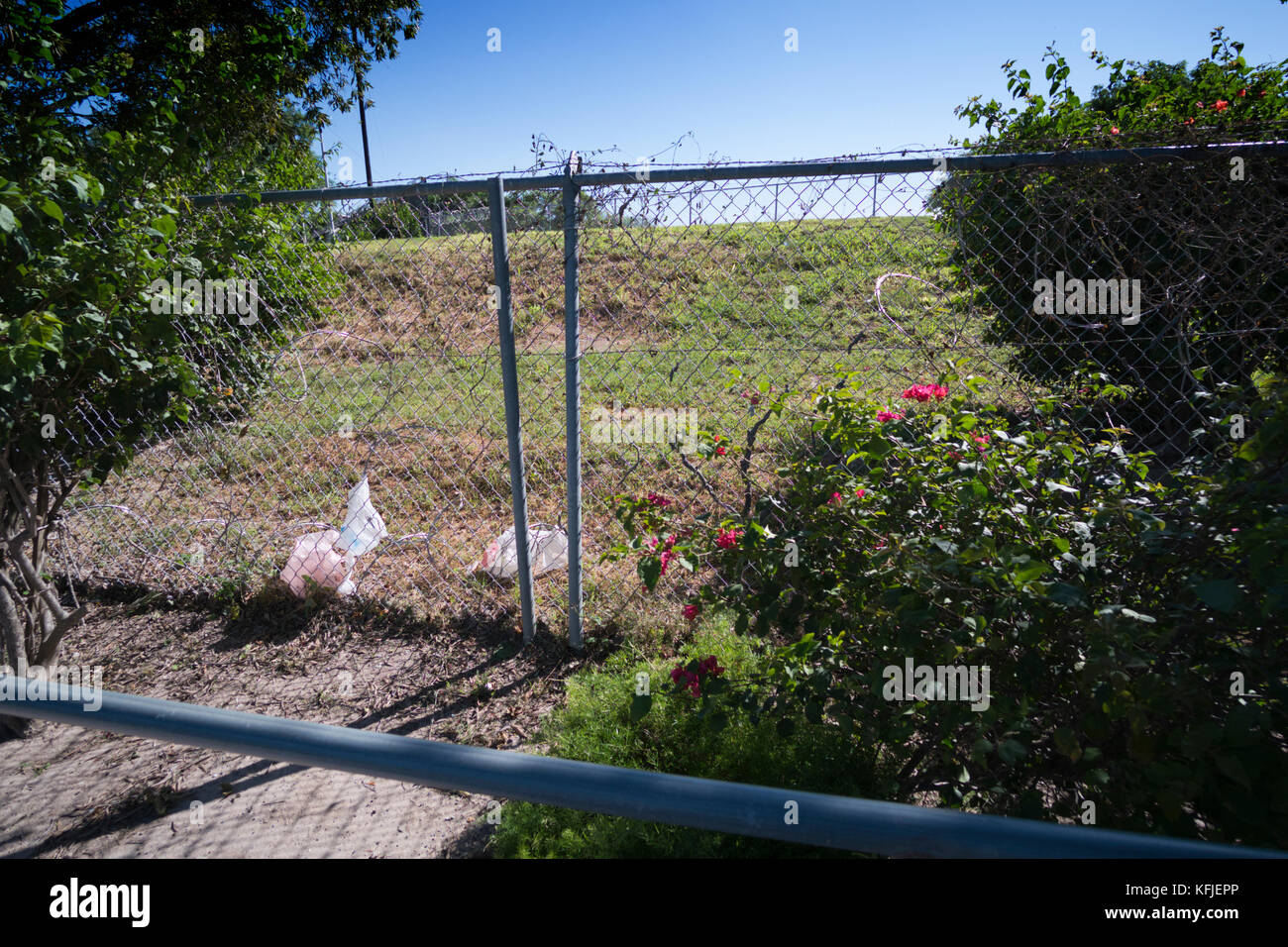 Chain link fence at the parking lot in Progreso Lakes, Texas to prevent