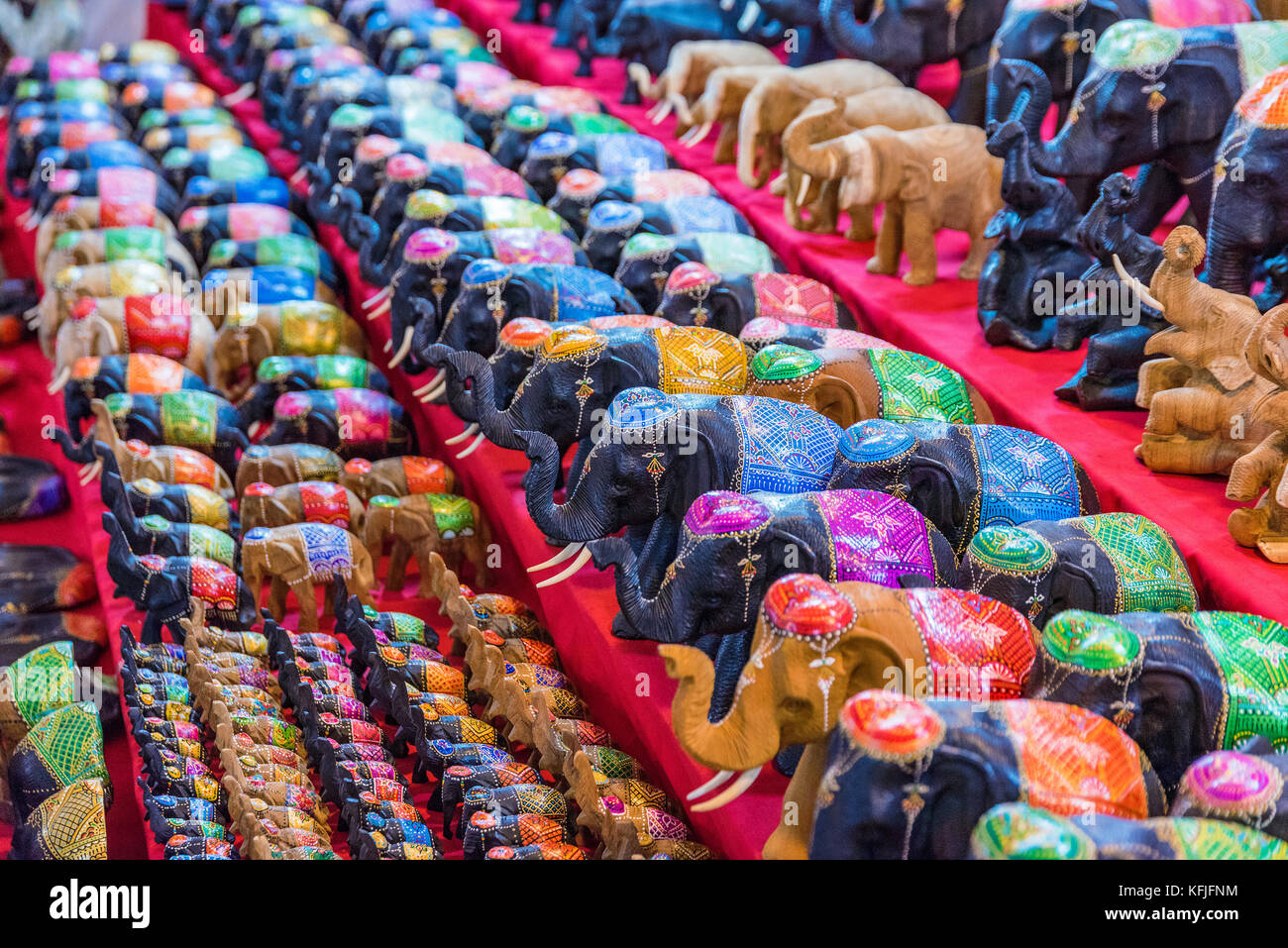 CHIANG MAI, THAILAND JULY 30 Wooden elephant ornaments in a souvenir stand in a night market