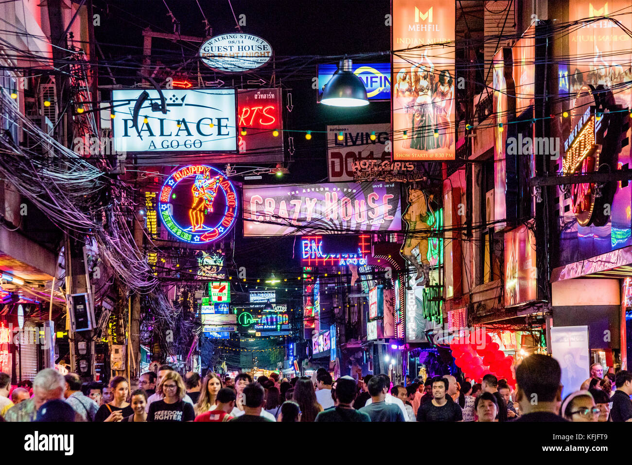 PATTAYA, THAILAND - AUGUST 07: This is Walking Street a famous red light district where many tourists come at night to visit clubs and bars on August  Stock Photo