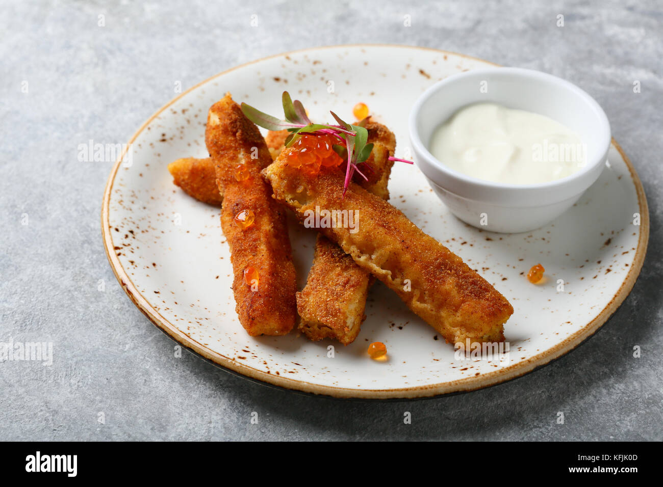 fish sticks with sauce on plate, food closeup Stock Photo Alamy