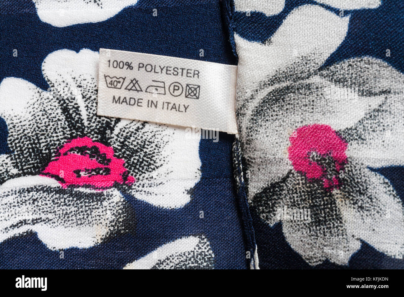 Label in woman's 100 polyester scarf made in Italy with care wash