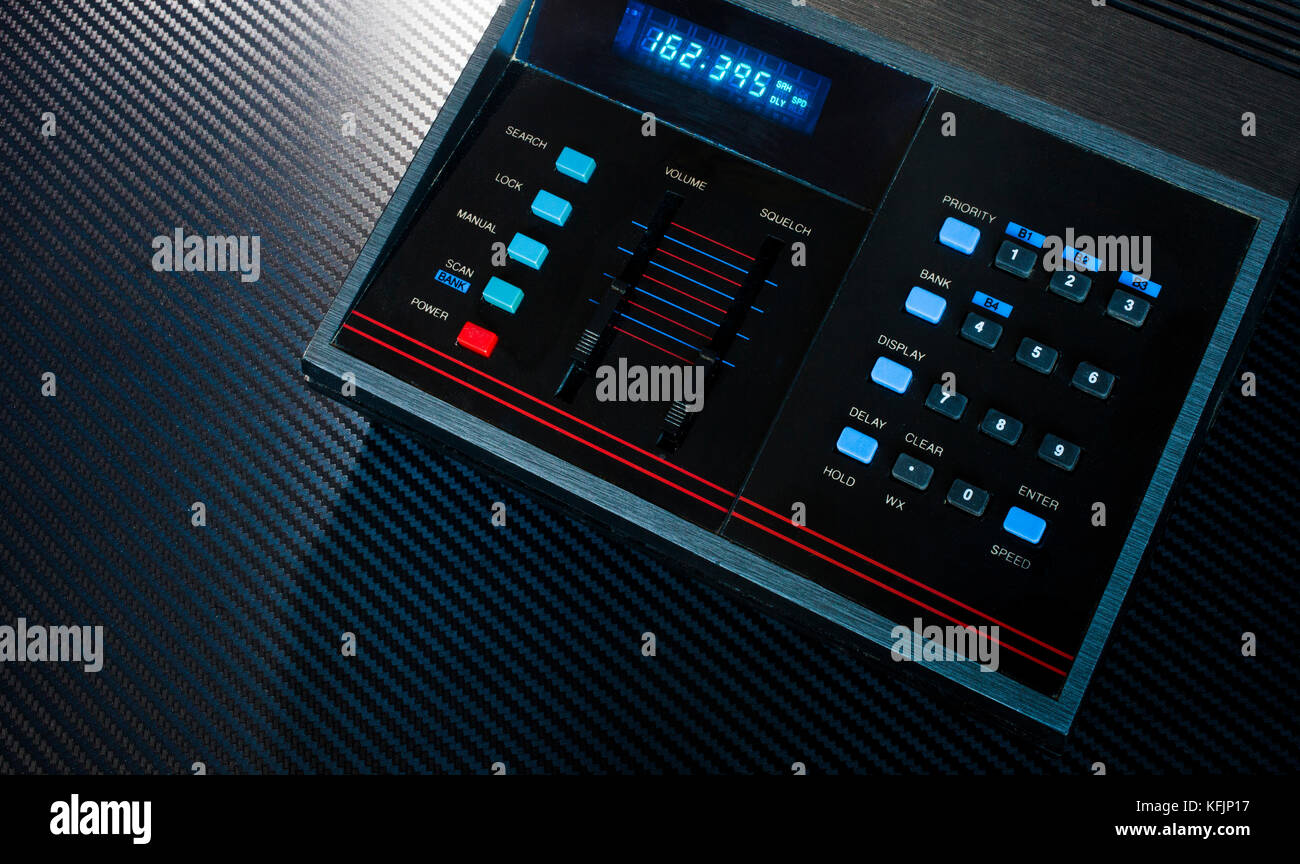 Scanner and weather radio on a dark background Stock Photo - Alamy