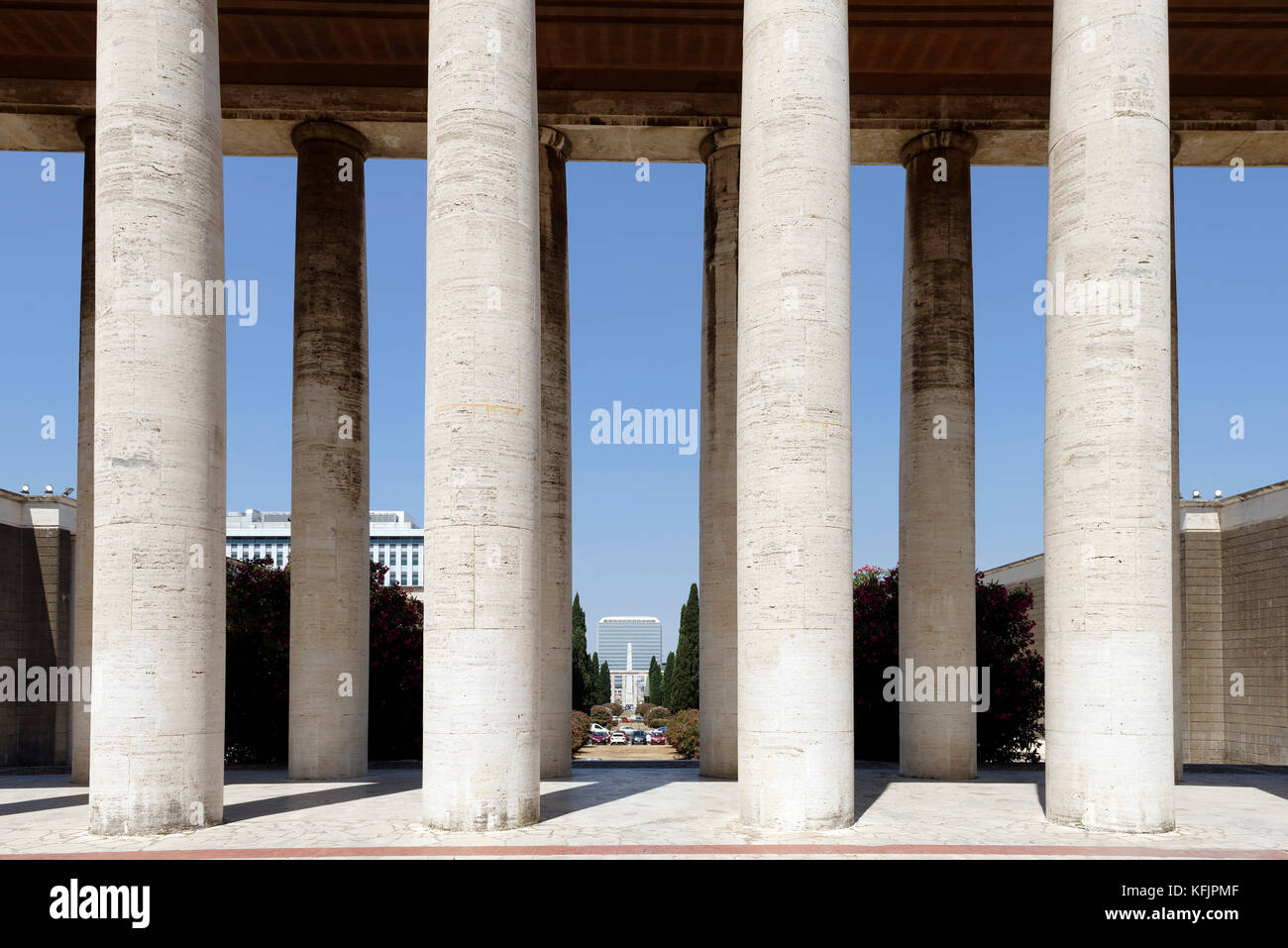 The colonnade portico of travertine columns of the Museum of Roman Civilisation (Museo della Civilta Romana). EUR, Rome, Italy. Stock Photo