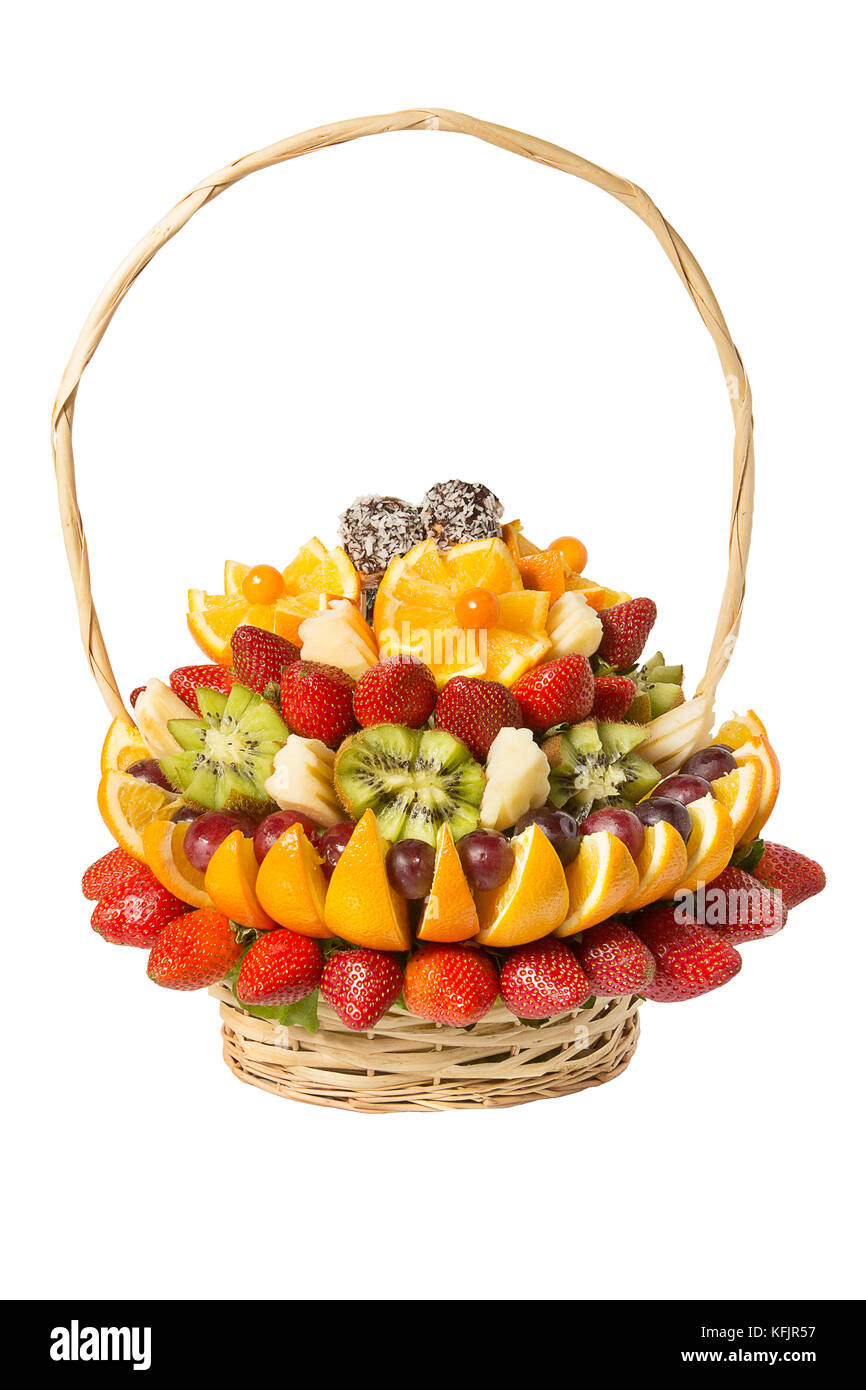 Basket with fruits and berries in chocolate isolated on white
