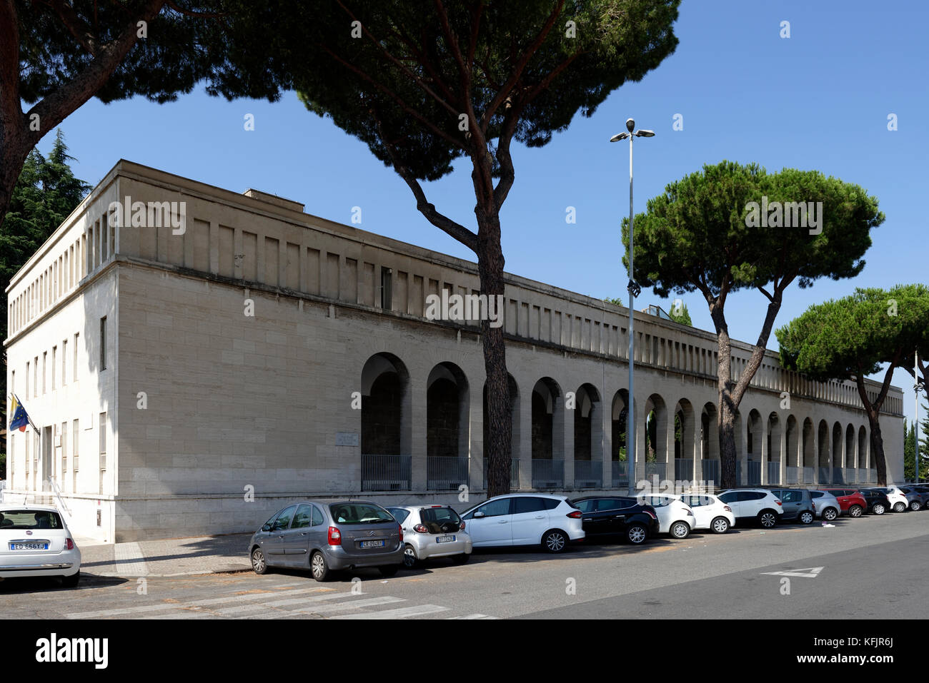 One of the two twin buildings that flank the Basilica of Saints Peter and Paul (Basilica dei Santi Pietro e Paolo). EUR, Rome, Italy. Stock Photo