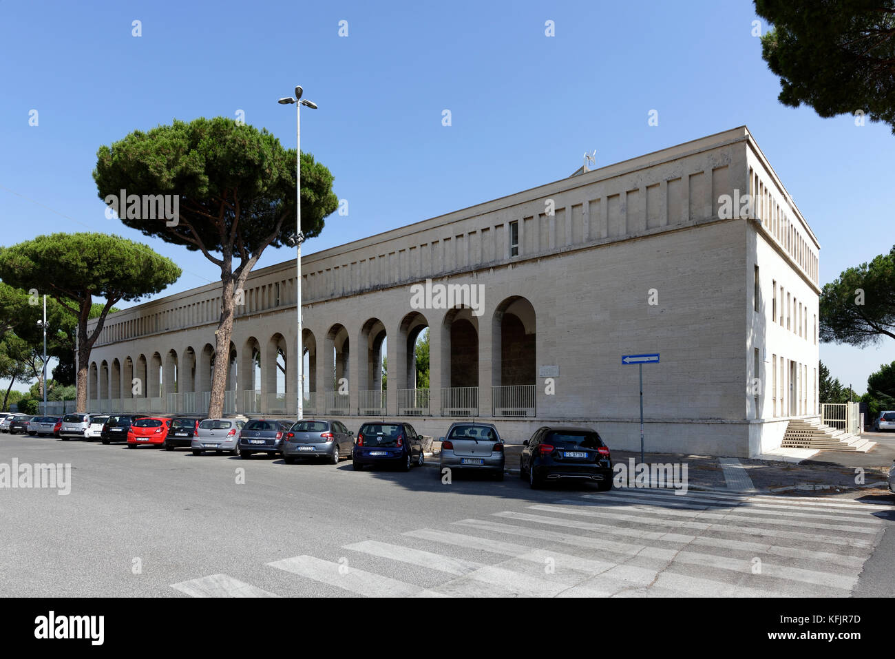 One of the two twin buildings that flank the Basilica of Saints Peter and Paul (Basilica dei Santi Pietro e Paolo). EUR, Rome, Italy. Stock Photo