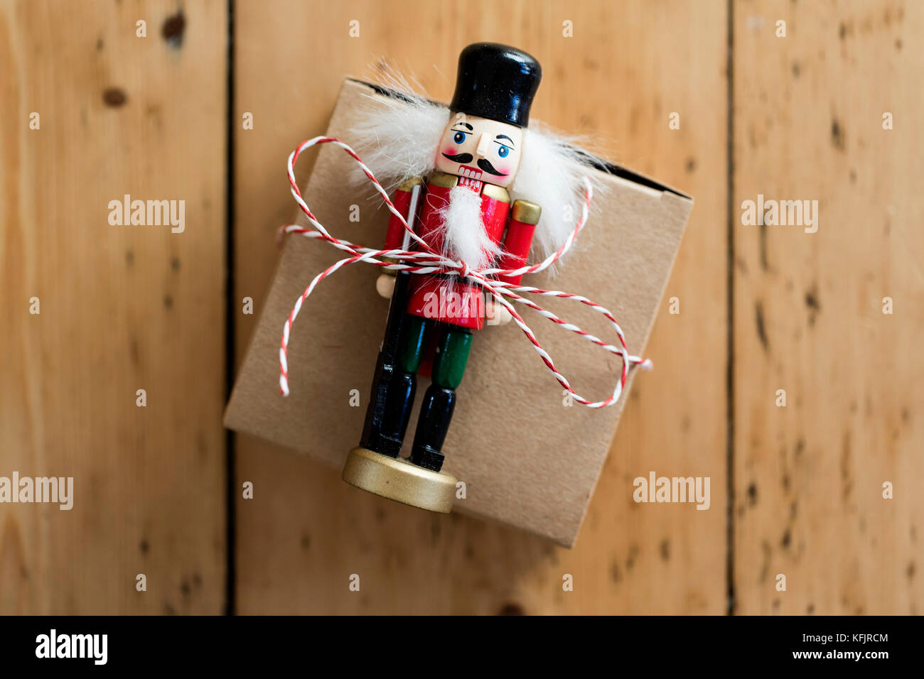 Christmas present box on a wooden background Stock Photo