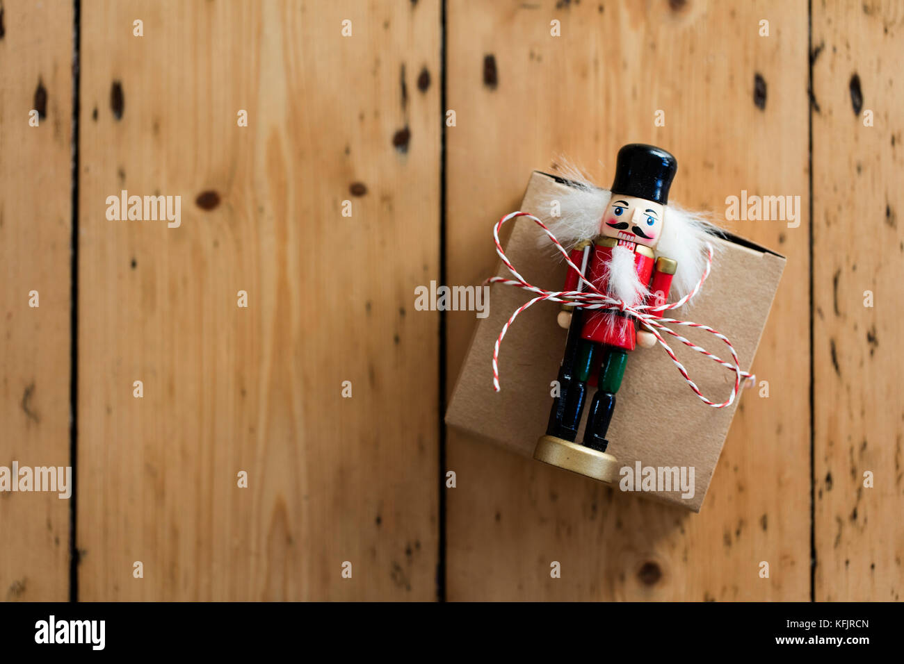 Christmas present box on a wooden background Stock Photo